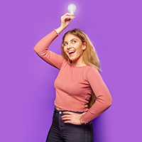 Student holding a light bulb above their head.