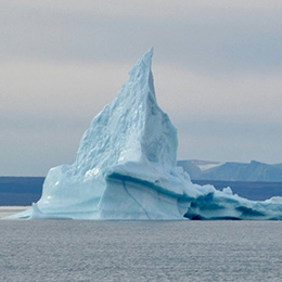 Broken off iceberg in the ocean. 