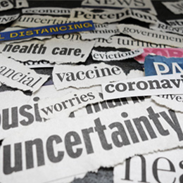 News clippings with single words relating to epidemics such as coronavirus, health care, worries, panic, social distancing, uncertainty, vaccine. 